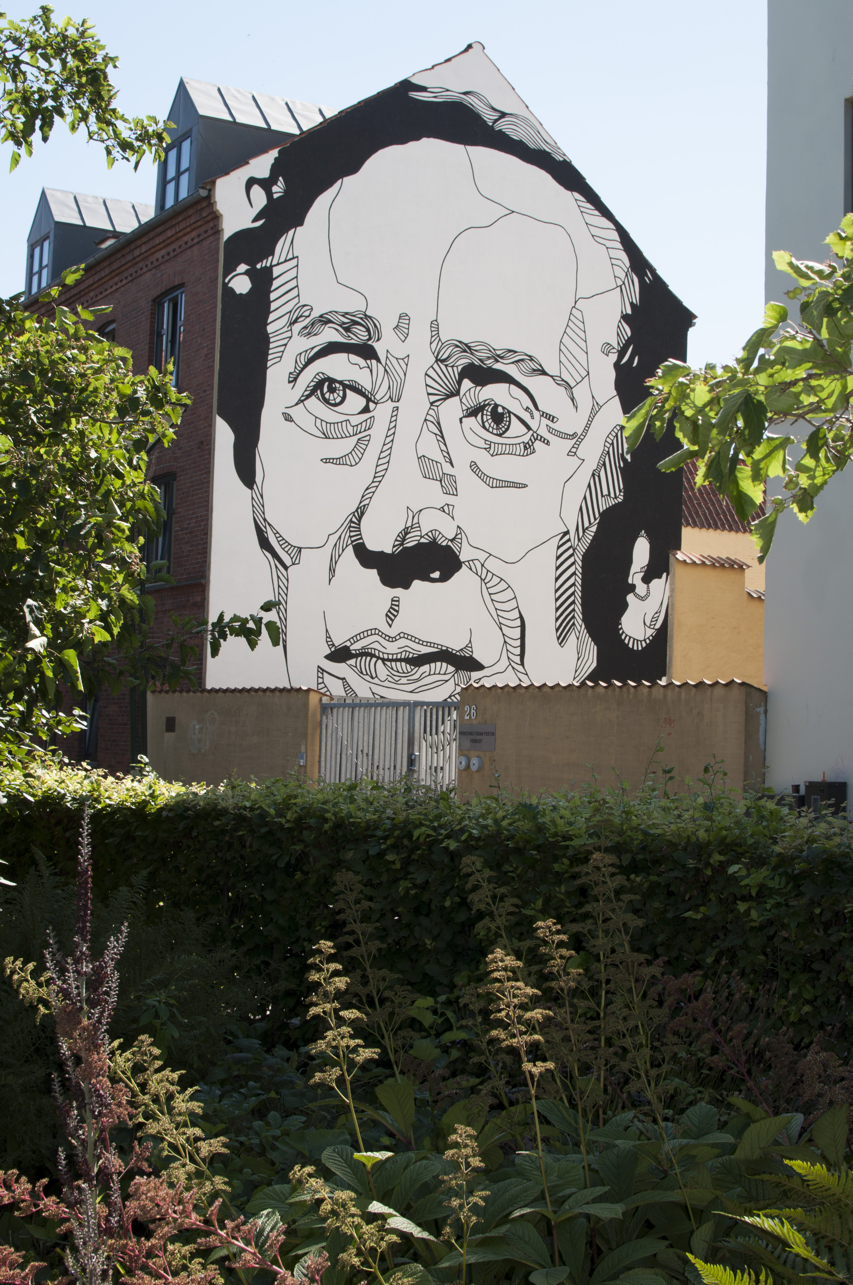 Sort/hvidt vægmaleri af H.C Andersen 