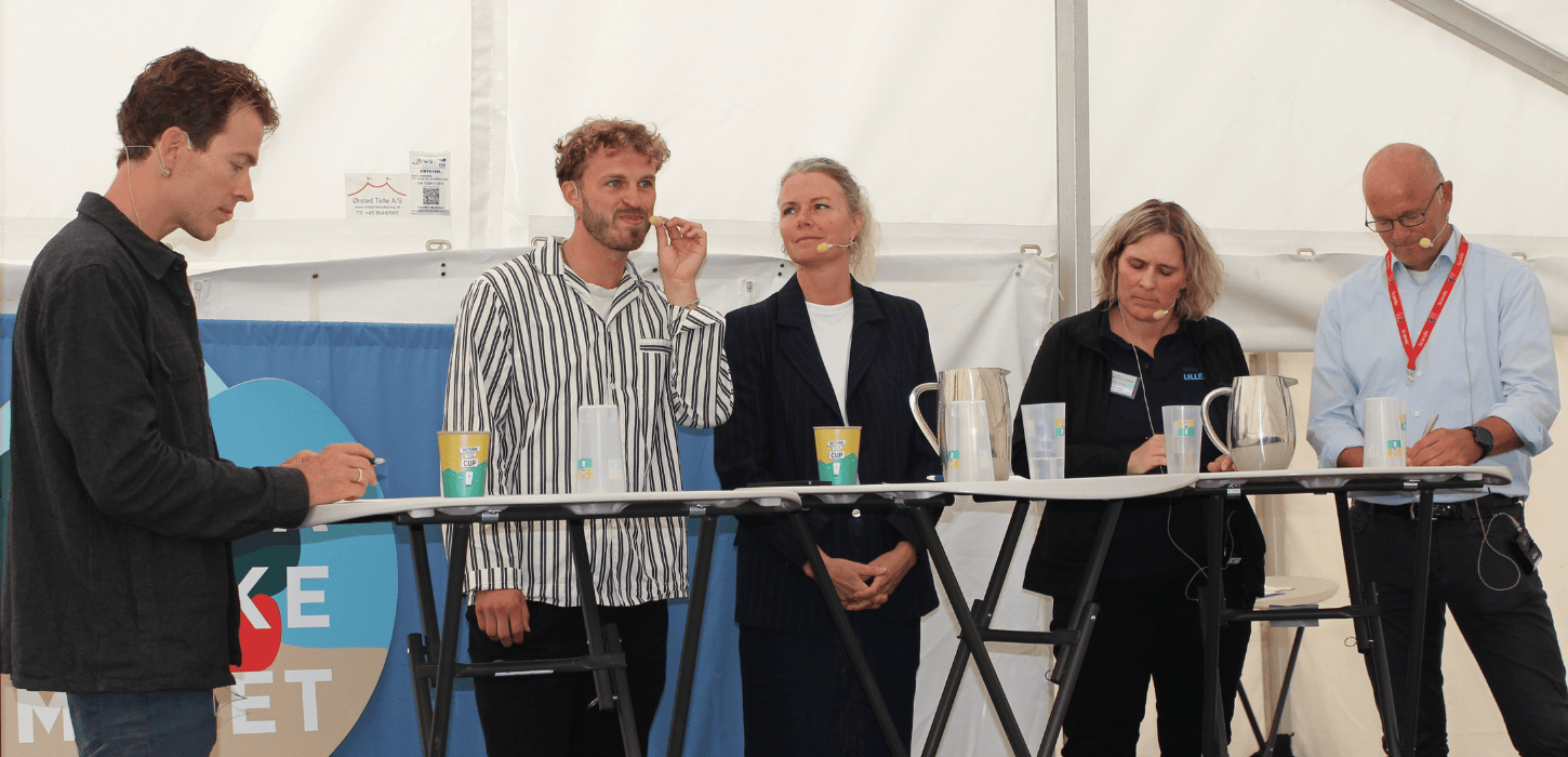 Fire paneldeltagere ved talk om bæredygtighed og turismeadfærd